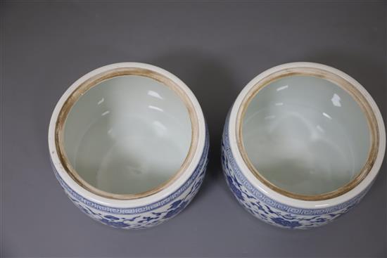 A pair of Chinese blue and white jars and covers, Yongzheng marks but later, D. 13.5cm